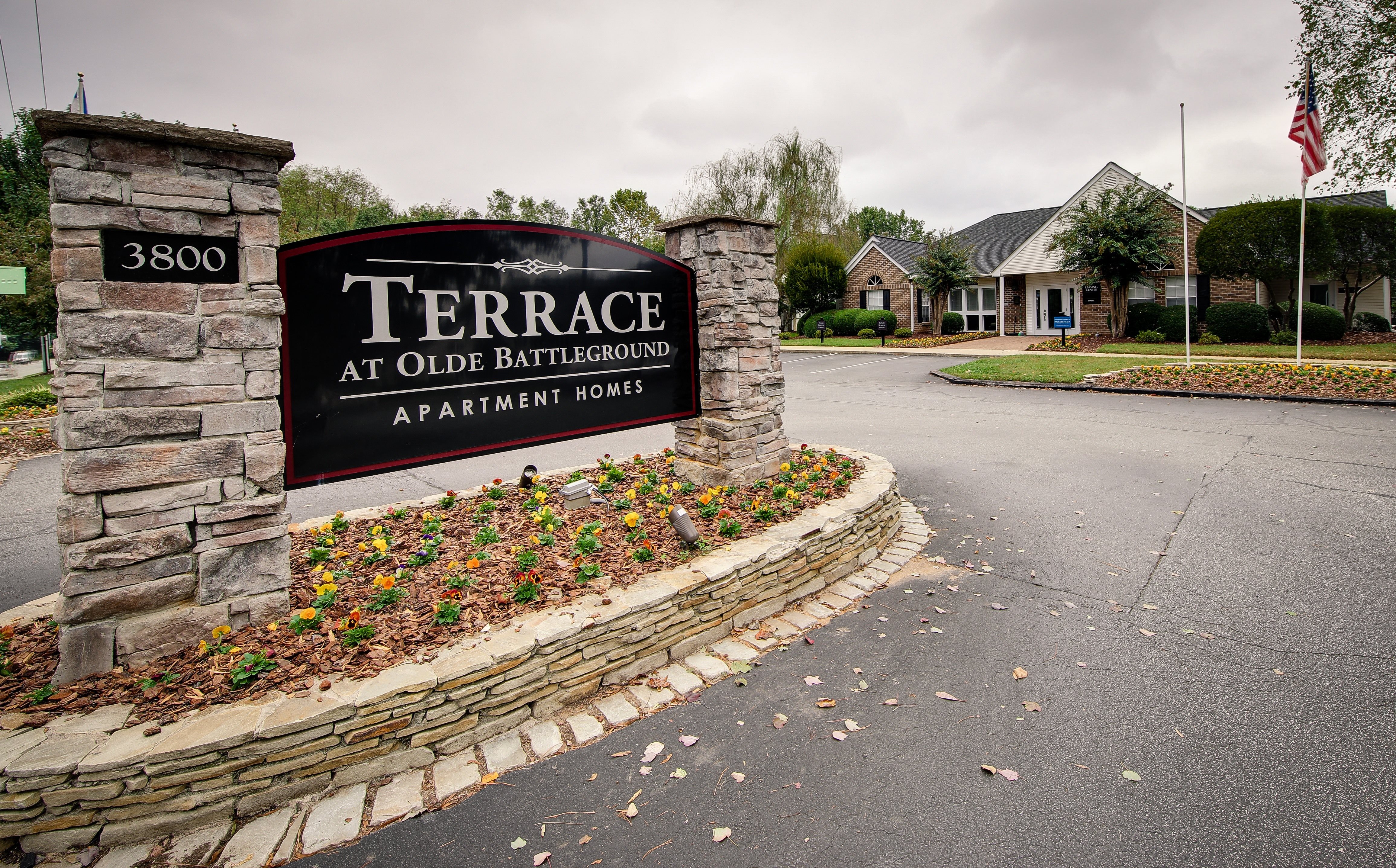 Exterior Signage at Terrace at Olde Battleground apartments in Greensboro, NC